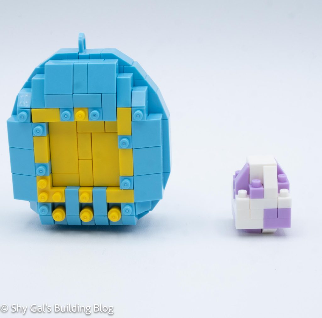 First Generation Tamagotchi (Blue) front view with egg