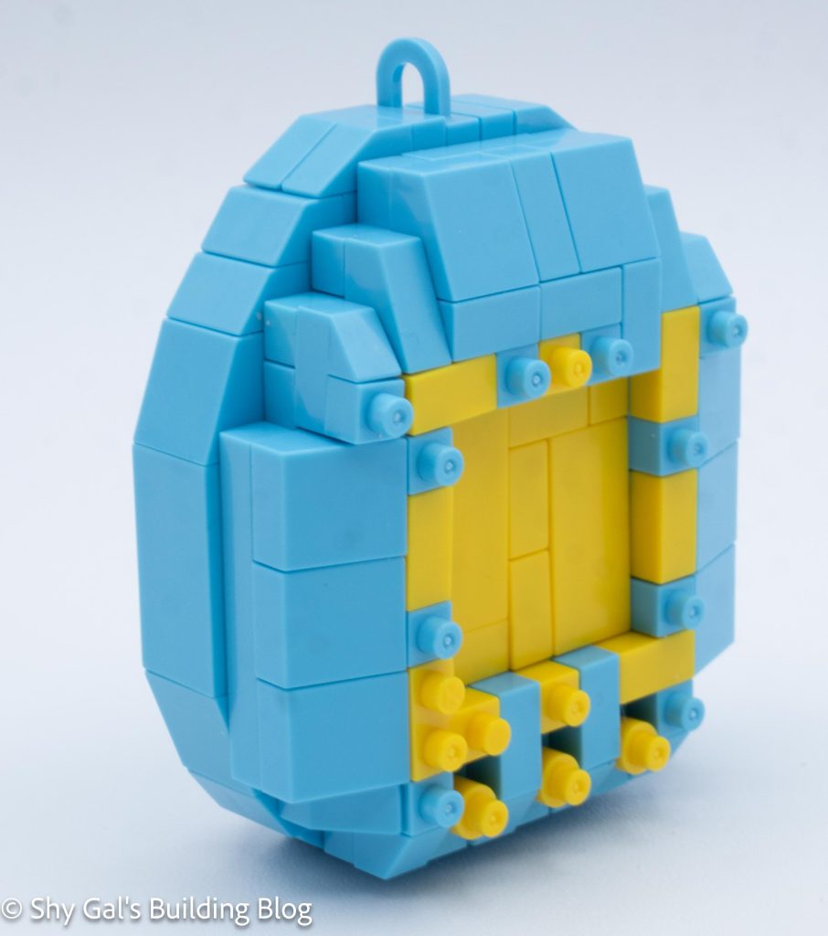 First Generation Tamagotchi (Blue) build fonrt 3/4 view